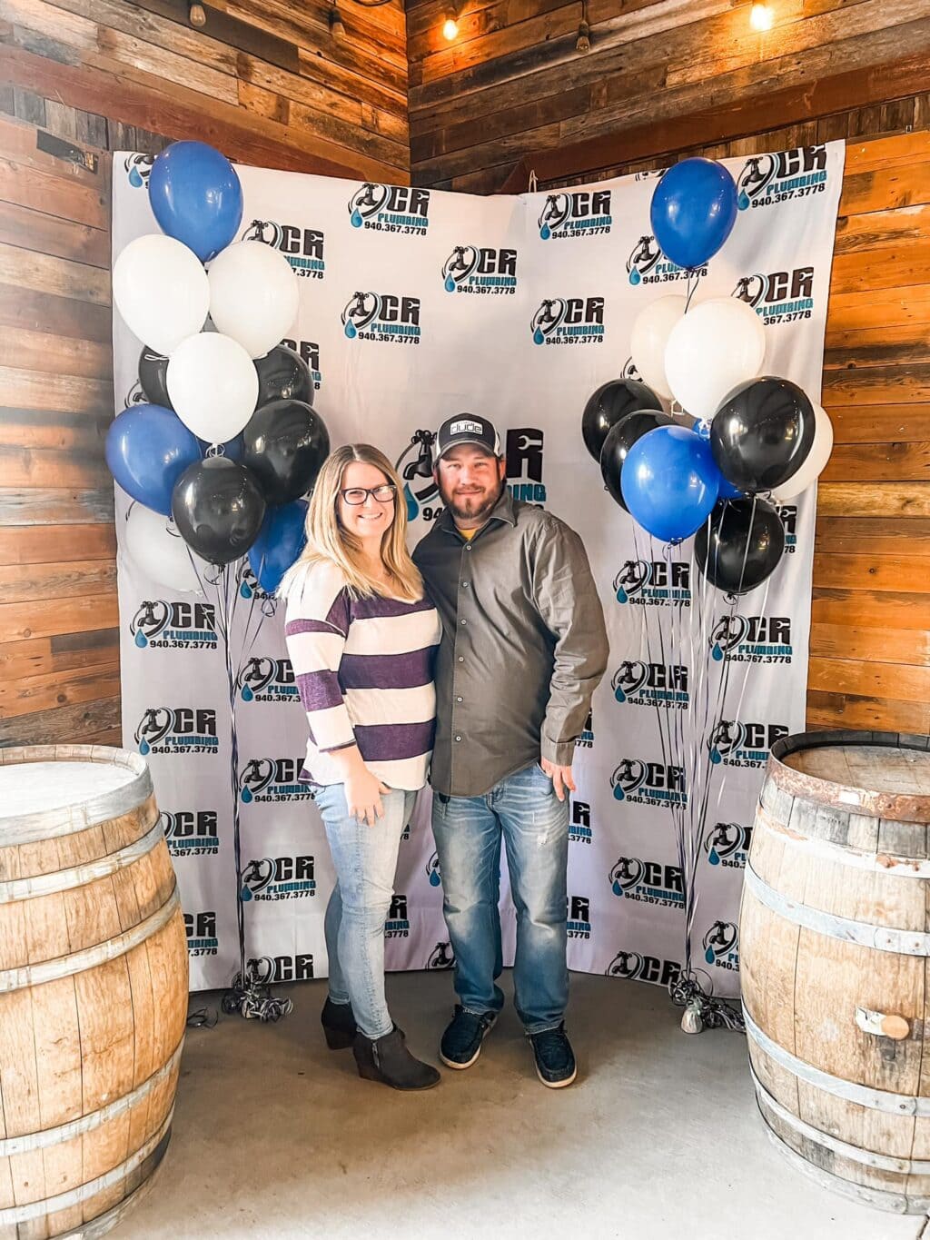 Couple wearing long sleeve and jeans.