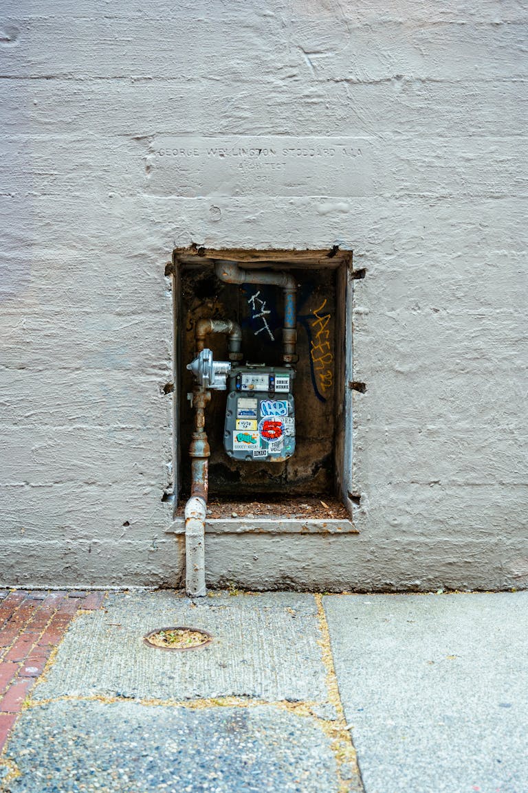 Meter Box in wall niche.