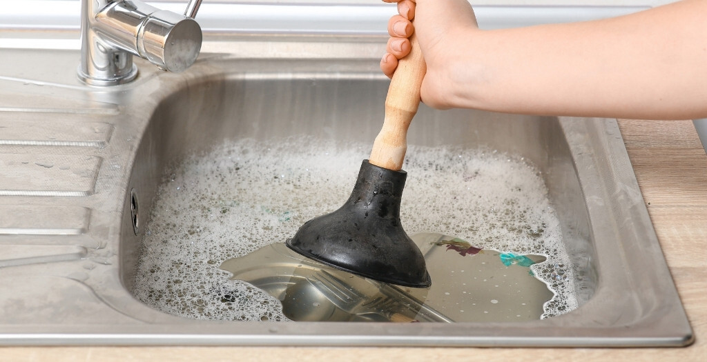 stubborn kitchen sink clogs